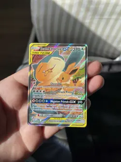 Pokemon TCG 2019 Black Star Promo #SM169 Evee & Snorlax GX Tag Team Holo - Image 1