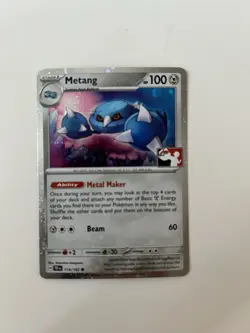 Metang 114 TEF Holo Prize Pack Play Stamped - Pokemon TCG Cards - Image 1
