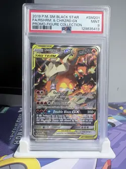 Pokemon TCG Reshiram & Charizard GX SM201 2019 PSA 9 TAG TEAM Holo Promo - Image 1