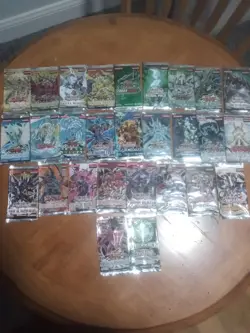 Collection of open Yu-Gi-Oh booster packs. - Image 1