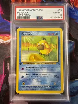 1999 Pokemon Fossil 53 Psyduck 1st Edition English PSA 8 NM/MT - Image 1
