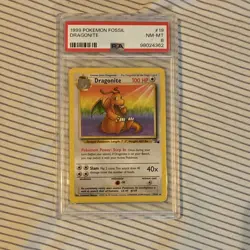 1999 Pokemon TCG Fossil Dragonite 4/62 Rare PSA 8 English WOTC - Image 1