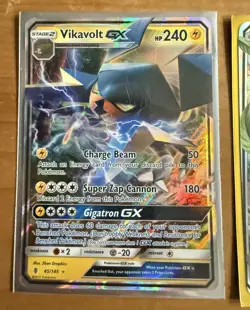Nintendo Pokemon TCG Sun & Moon GX Holo 7-Card Lot Vikavolt/Drampa & More - Image 1