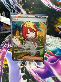 MELA 140/131 PRISMATIC EVOLUTIONS Holo Ultra Rare Pokemon - Image 1