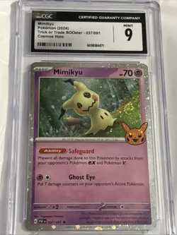 Pokemon Mimikyu 2024 Trick Or Trade BOOster 037/091 Cosmos Holo CGC 9 Graded - Image 1