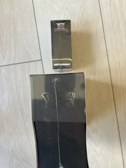 Pokemon Pitch Black ETB and booster bundle in hand - Image 5