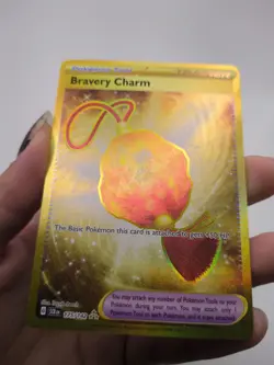Bravery Charm 175/142 Gold Hyper Rare 2024 Pokemon Stellar Crown Card NM - Image 2