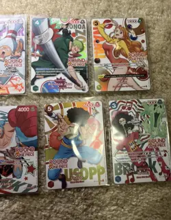Round 1 One Piece Card Complete Set Of 10 English Promo Card Set in hand. - Image 2