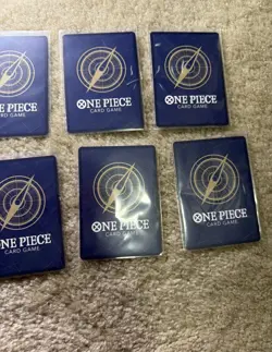 Round 1 One Piece Card Complete Set Of 10 English Promo Card Set in hand. - Image 5