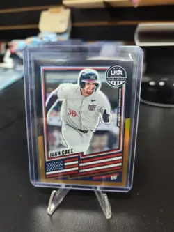 2026 Panini Stars & Stripes Prizm USA Baseball #24 Juan Cruz BLACK/GOLD 1/5 - Image 1