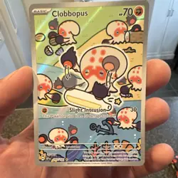 The Pokemon TCG Clobbopus 207/191 Surging Sparks IR English NM/LP+ - Image 1