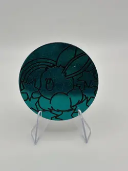 Pokemon Prismatic Evolutions Tin JUMBO Glitter Eevee Coin Teal (Umbreon) - Image 1