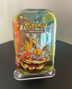 Pokemon Pokemon TCG Prismatic Evolutions Mini Tin Jolteon 2 Booster Packs EN - Image 1