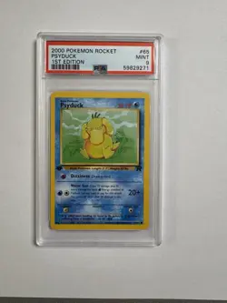 Psyduck 65/82 2000 Team Rocket 1st Edition Pokemon Card TCG Vintage WOTC PSA 9 - Image 1