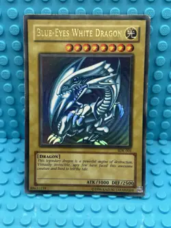 Yugioh Blue-Eyes White Dragon SDK-001 Damaged - Image 1