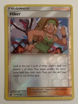 Hiker 133/168 Pokemon TCG SM Celestial Storm Reverse Holo LP - Image 1