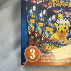 Pokemon TCG Surging Sparks Booster Bundle Sealed with 3 Pokemon Packs - Image 2