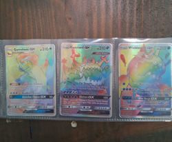 Gumshoos, Guzzlord, and Wishiwashi rainbow gx cards - Image 1
