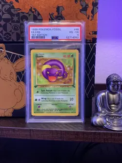 pokemon 1999 fossil ekans 1st edition PSA 4 - Image 1
