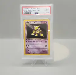 2000 POKEMON ROCKET 1ST EDITION #1 DARK ALAKAZAM-HOLO PSA 8 - Image 1