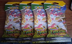 4 Sleeved Booster Pack Lot Pokemon EVOLVING SKIES Factory Sealed - Image 1
