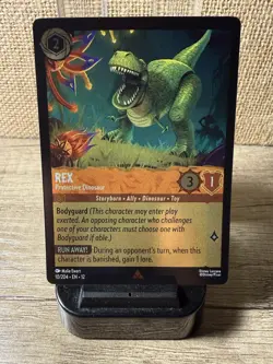 Lorcana Wilds Unknown Rex - Protective Dinosaur - Rare Cold Foil 10/204 NM/M+! - Image 1