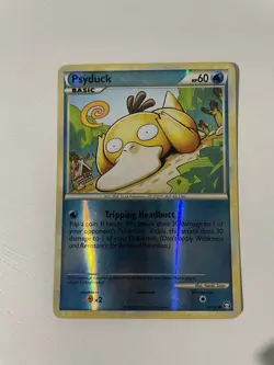Psyduck 74/102 Reverse Holo Pokemon Card HeartGold SoulSilver Triumphant LP - Image 1