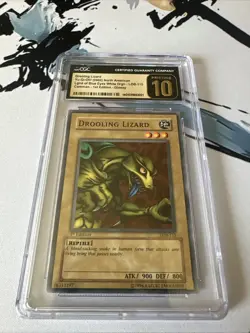 Yugioh Drooling Lizard LOB-115 1st Edition CGC 10 Pristine Gold Label - Image 1