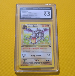 CGC 8.5 Aerodactyl Fossil 1st Edition Prerelease *Cosmos Rare! Holo 1/62 1999 EN - Image 1