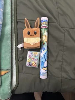 Pokemon Prismatic Evolutions UPC Accessories: Playmat, Eevee Deck Box, Sleeves - Image 1