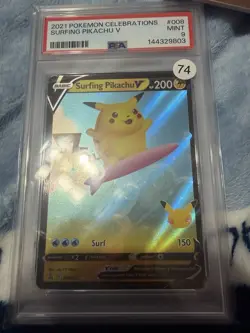 Pokemon TCG Surfing Pikachu V #008/025 Celebrations Holo Ultra Rare PSA 9 - Image 1