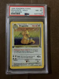 Pokemon Dragonite Fossil 1st Edition Holo Rare #4 PSA 8 - Image 1