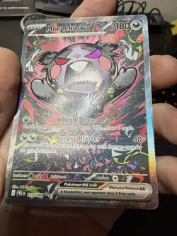 Morpeko ex 117/084 - Pitch Black SIR - Card in hand - Image 2