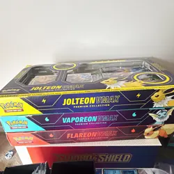 Pokemon TCG Premium Collection Jolteon VMAX Vaporeon VMAX Flareon VMAX 3 Box En… - Image 1