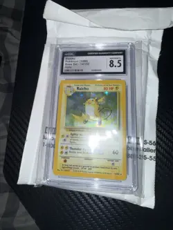 Pokemon Base Set Raichu 14/102 Holo CGC 8.5 NM+ 1999 WOTC Graded Card - Image 1