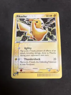 2003 Pokemon Pikachu #012 Black Star Promo Cosmos Holo EX Series Collector's Tin - Image 1