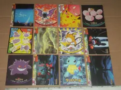 12 Topps 1999 Pokemon trading cards 2 holograph, 1 Sticker, Puzzle, Base Set - Image 1