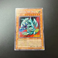 Yu-Gi-Oh! TGG 1st Edition Blue-Eyes Toon Dragon MRL-000 Secret Rare English LP - Image 1