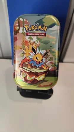 Prismatic Evolutions Jolteon Mini Tin, Art card, and Coin Only! BRAND NEW! - Image 2
