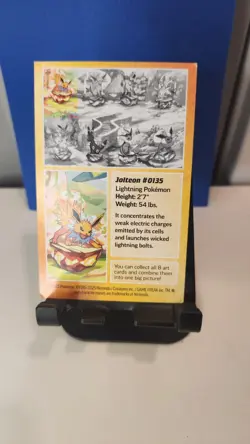 Prismatic Evolutions Jolteon Mini Tin, Art card, and Coin Only! BRAND NEW! - Image 4