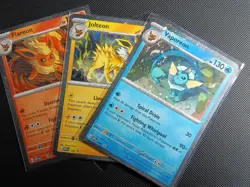 Vaporeon Flareon Jolteon Prismatic Evolutions Poster Collection Cosmic Promo Set - Image 1