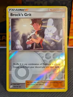 Pokemon TCG Brock's Grit 135/181 SM Team Up Reverse Holo Uncommon NM - Image 1