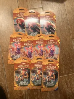Disney Lorcana TCG Wilds Unknown Sleeved Booster Pack Lot of 10 Sealed - Image 1