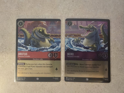 Disney Lorcana - Reign of Jafar - NM Foil Brutus & Nero Cards Set 3 - Image 1