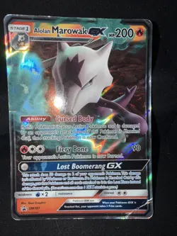 Pokemon TCG Sun & Moon Alolan Marowak GX SM187 Black Star Promo DMG - Image 1