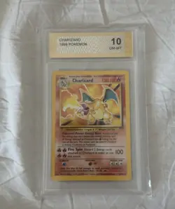Charizard 1999 Pokemon Base Set PGC 10 Graded Card #4/102 Wizards of the Coast - Image 1