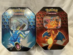 Pokemon TCG Hidden Fates Charizard & Gyarados Tin Set (2 Tins) - Image 1