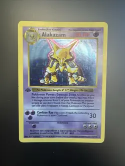 First Edition Base Set Alakazam 1/102 MP Pokemon 1st Edition Card - Image 1