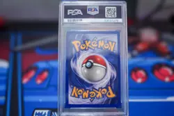 1999 POKEMON FOSSIL #4 DRAGONITE-HOLO PSA 7 - Image 2