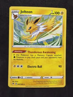 POKEMON JOLTEON 147/185 RARE COSMOS HOLO WITH PARTIAL ROUND SWIRL VIVID VOLTAGE - Image 1